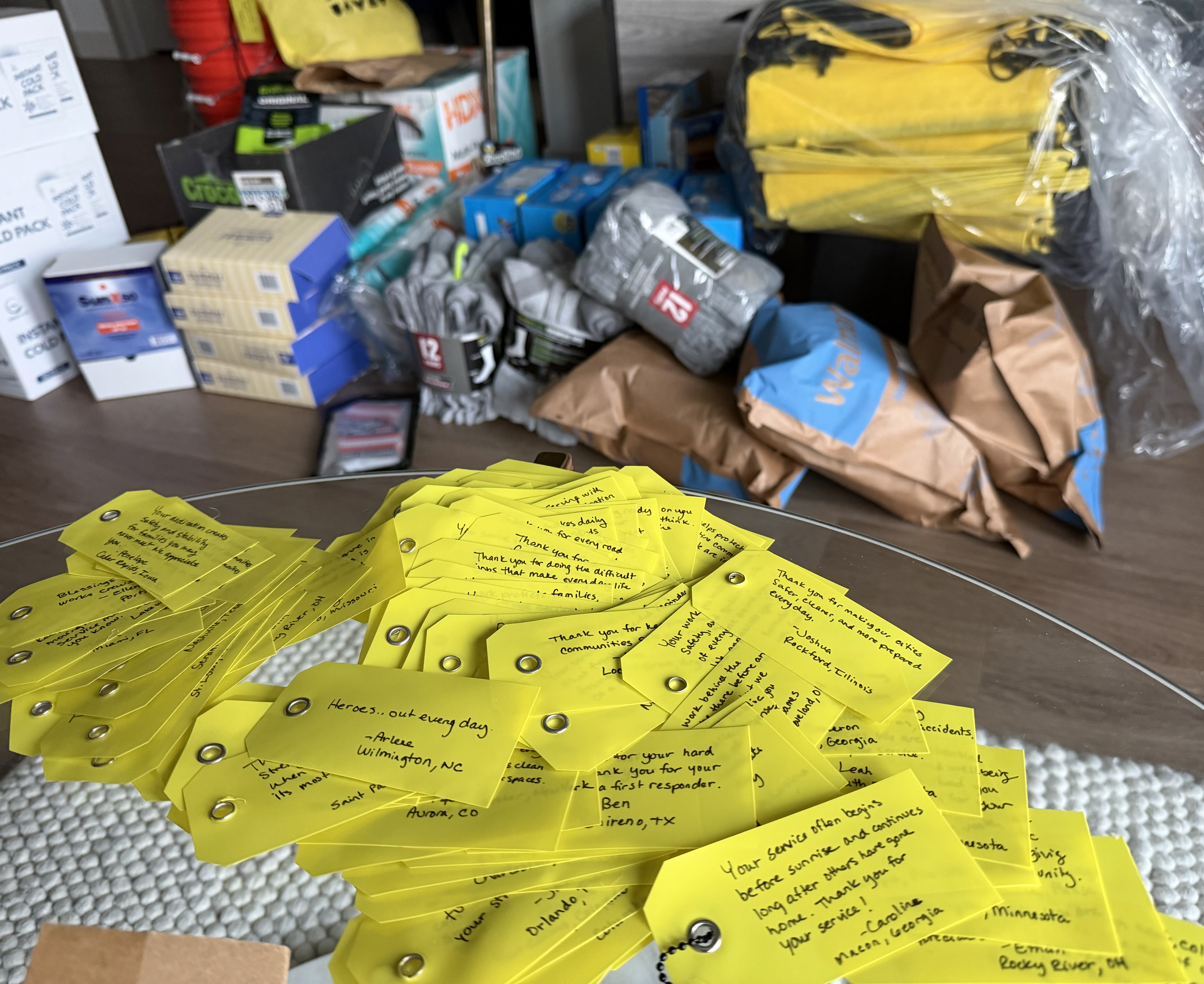 Donated supplies from Home Depot and Giant Eagle being packed into Frontline Recognition Packs